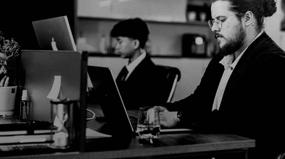 Consultants discuss banking and staffing in an office